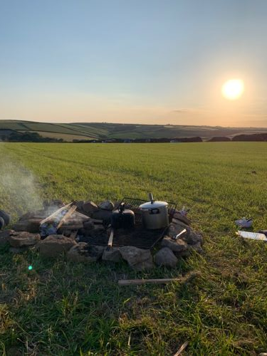 fire in campsite field Treza